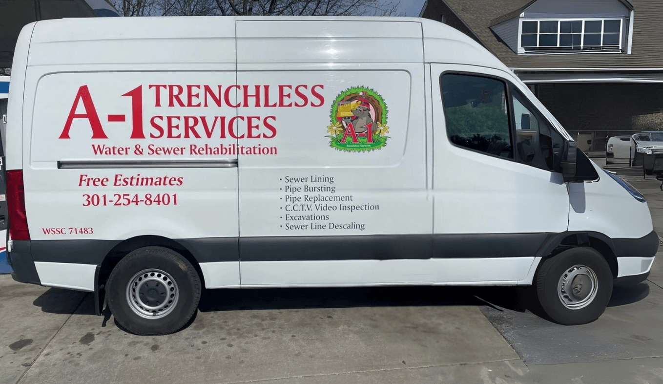 White A-1 Trenchless Services van, side view, lettered with Water and Sewer Rehabilitation and the company phone number